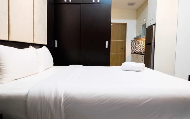 Warm and Homey Studio at The Oasis Cikarang Apartment By Travelio